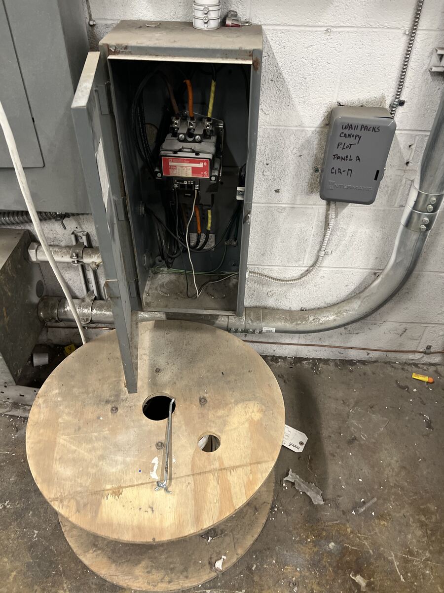 Burnt lighting contactor for outdoor parking lot lights